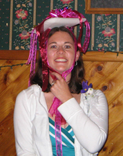 wedding bows make a hat for this bride-to-be at one wedding shower